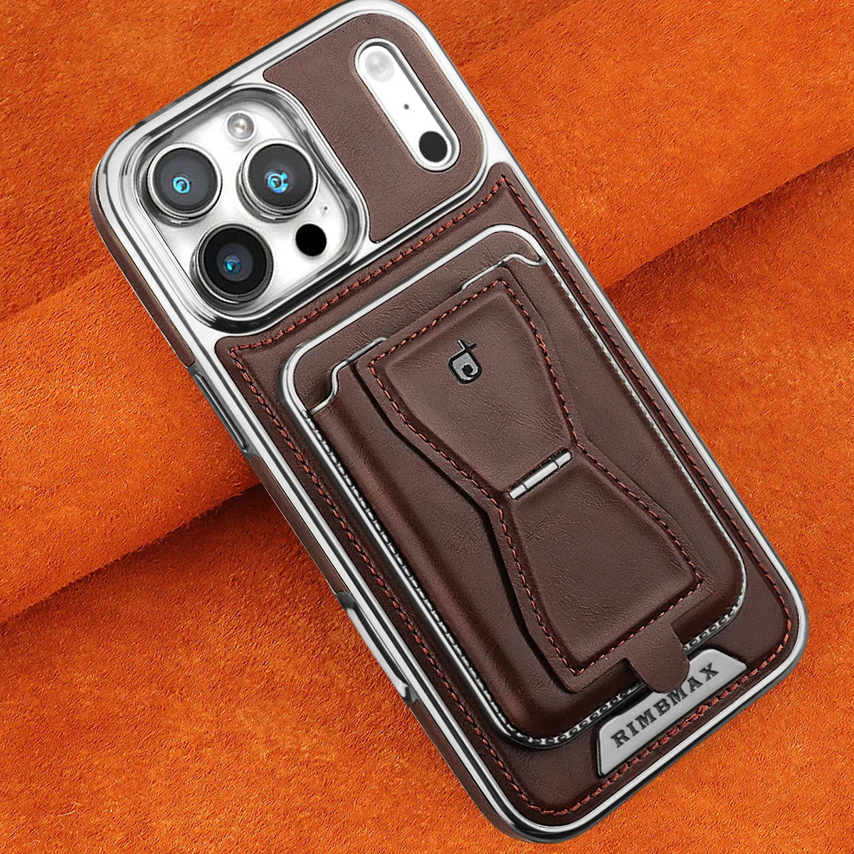 The RIMBMAX® MALCOLM is a classic leather phone case featuring a secure card holder and stable stand. Perfect protection for the modern Rimbmax user.-iPhone 17 Pro Max, Bronze