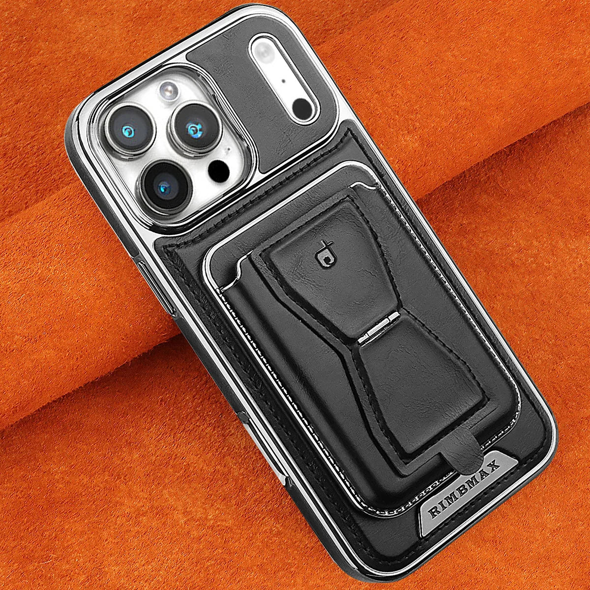 The RIMBMAX® MALCOLM is a classic leather phone case featuring a secure card holder and stable stand. Perfect protection for the modern Rimbmax user.-iPhone 17 Pro Max, Bronze