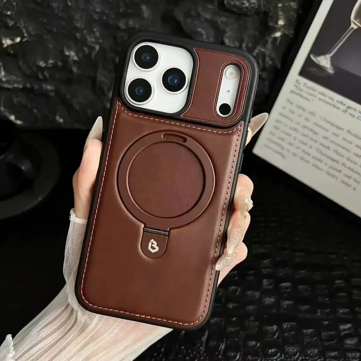 Upgrade to the RIMBMAX® MATEO. This premium leather phone case supports seamless MagSafe charging. Durable, stylish, and 100% authentic Rimbmax-iPhone 17 Pro Max, Bronze